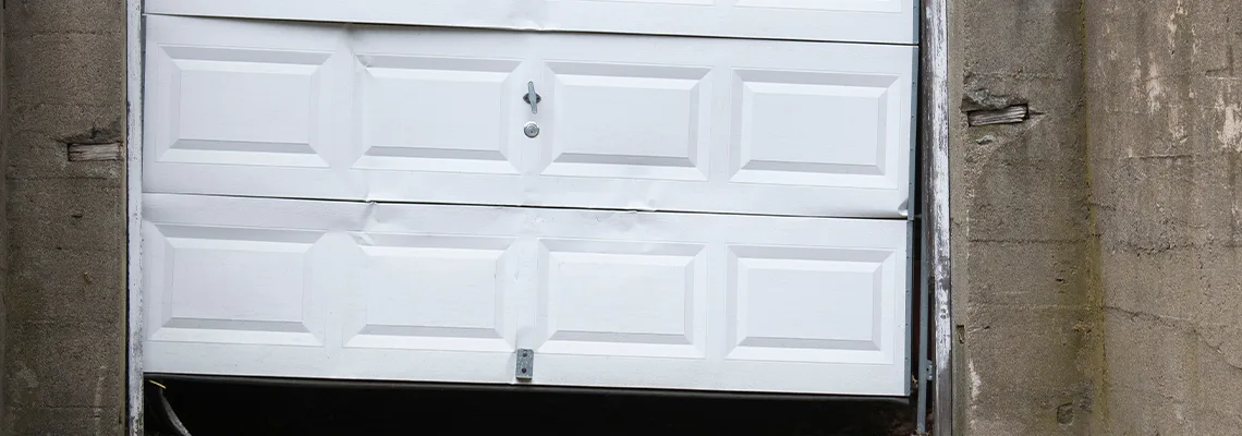 Garage Door Got Hit By A Car Dent Removal in Orleans, ON