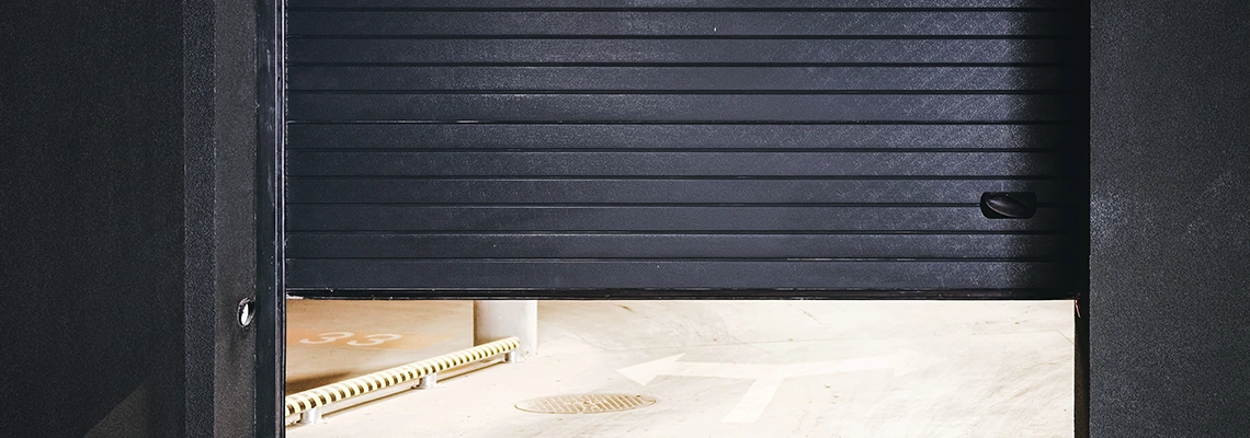 Residential Black Garage Door Installation in Orleans, ON