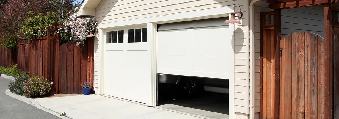 Fix Metal Garage Door Jerking in Orleans, Ontario